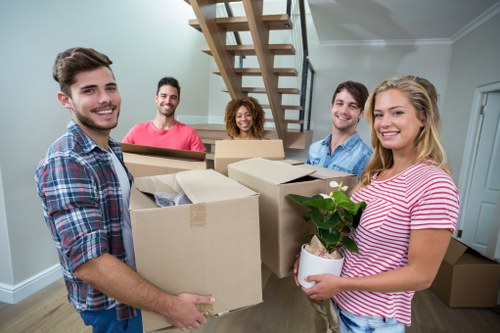 Local removals van loading household items near New Southgate