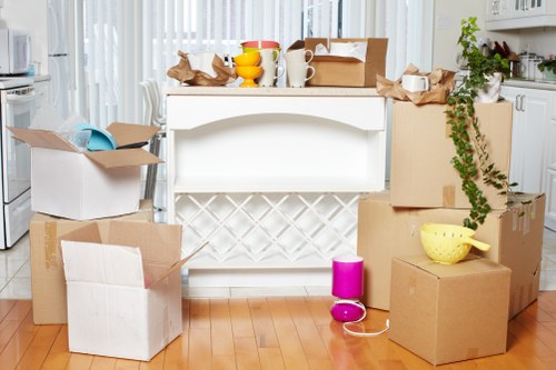 Office desks and storage being prepared for transport