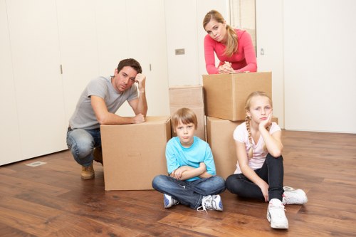 Professional movers preparing furniture for home moves in Newsouthgate