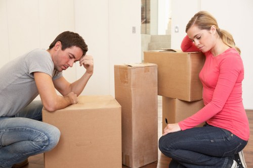 Local flat removals in Newsouthgate with moving van and packed boxes