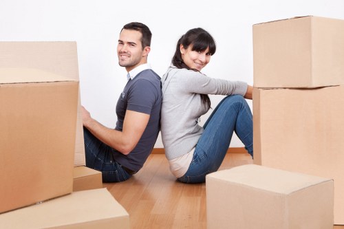 Careful packing of fragile items during a Newsouthgate house move